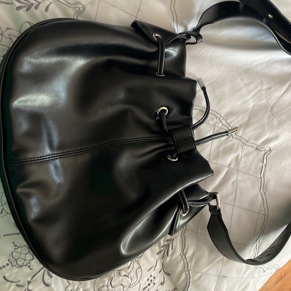 Calvin Klein black crossover hardly used.